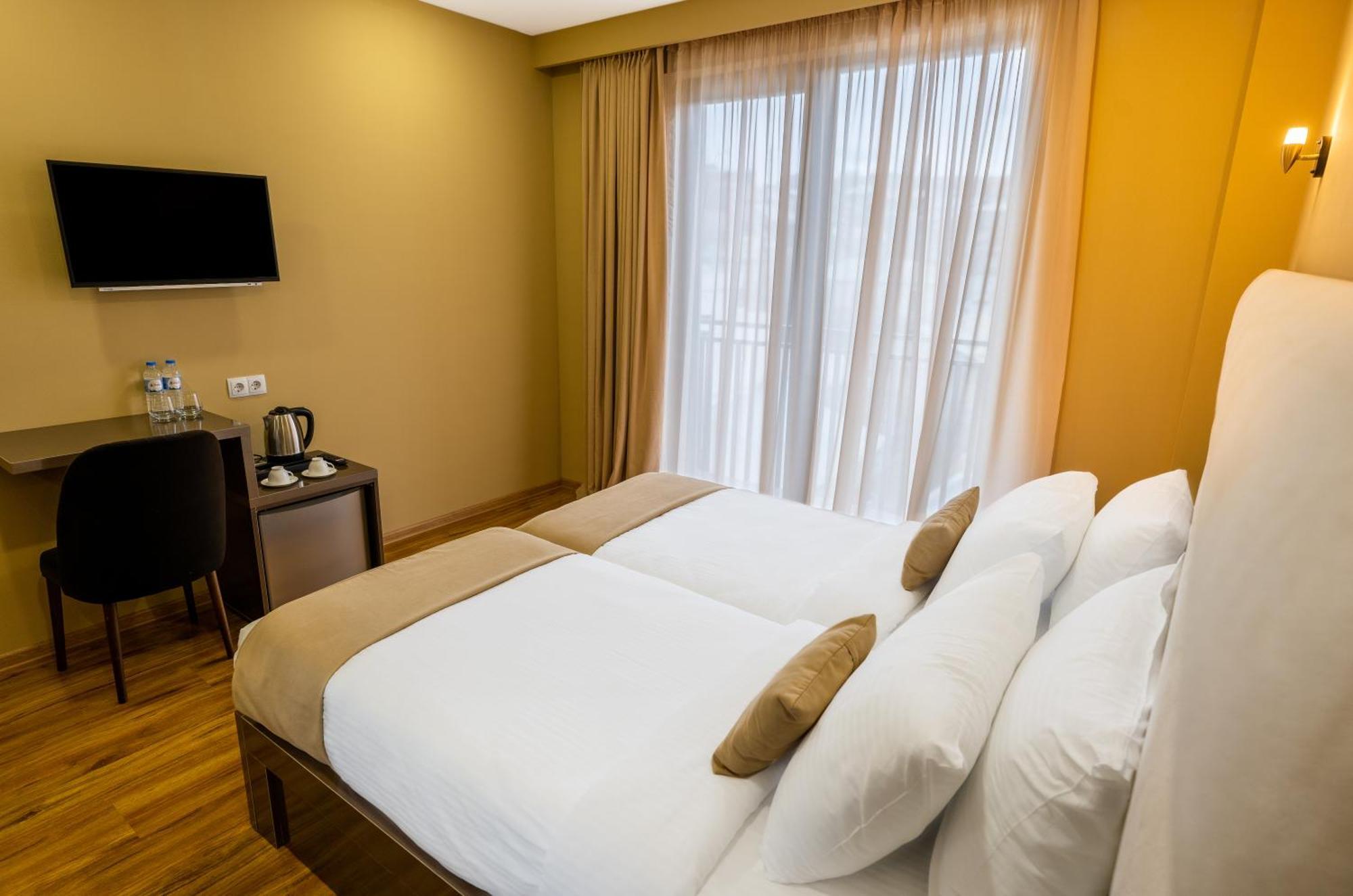 Hotel Residence Plaza Tbilisi Rum bild